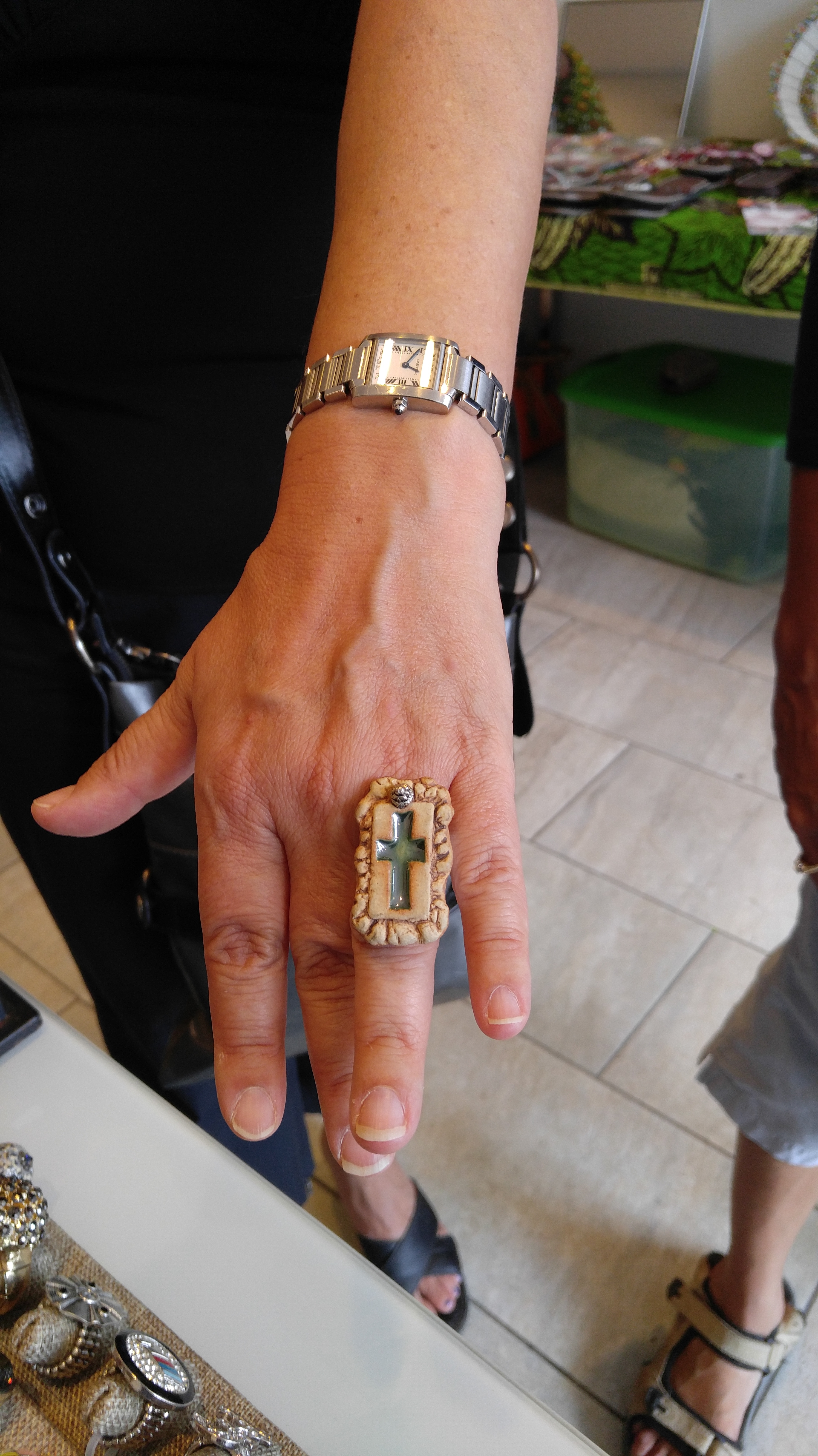 Customer wears ceramic ring with cross mold, Adams Morgans Day DC, Sept. 2016