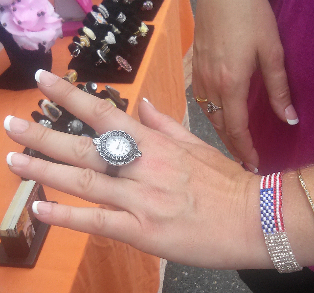 July 4th at St. Luke's church, guest admires watch ring