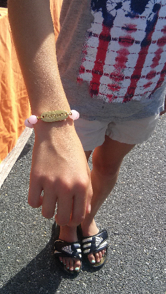 St. Lukes Arts & Crafts Show - Ellie loves her bracelet!
