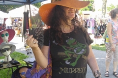 Customer donning her new hat at the Common Ground Festival in July
